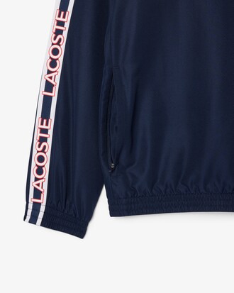 Chaqueta deportiva con bloques de color y cinta de logotipo