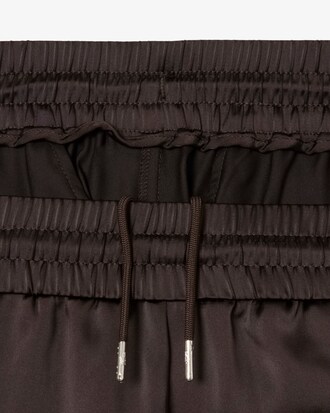 Pantal&oacute;n deportivo satinado oversized