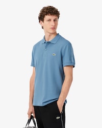 Polo de rayas con logotipo de corte regular