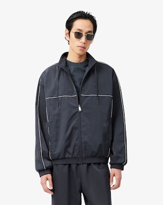 Chaqueta de ch&aacute;ndal hidr&oacute;fuga con ribete en contraste