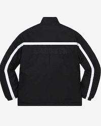 Su&eacute;ter unisex Lacoste x Supreme&reg; con media cremallera