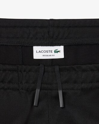 Pantal&oacute;n de ch&aacute;ndal de piqu&eacute; con ribete en contraste