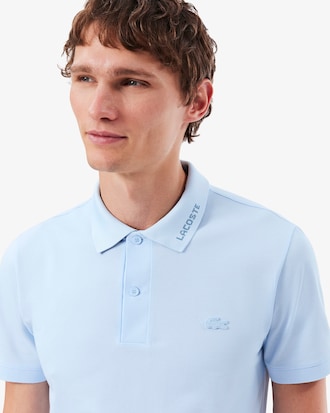 Polo Commuter de piqu&eacute; de corte ajustado con detalles de marca de jacquard