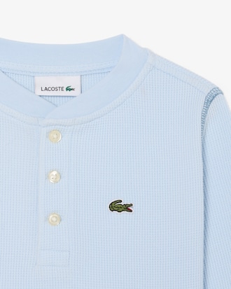 Camiseta con botones de punto gofrado