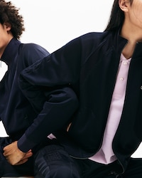 Chaqueta unisex Lacoste LIVE en tejido resistente con cremallera y bordado gr&aacute;fico