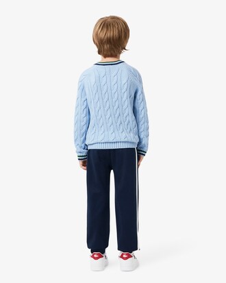 Pantal&oacute;n de ch&aacute;ndal deportivo con raya decorativa