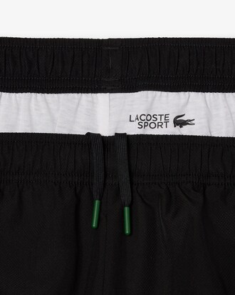 Pantalón corto de rayas con logotipo deportivo