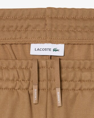 Pantal&oacute;n de ch&aacute;ndal de piqu&eacute; con pinza frontal