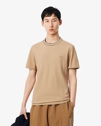 Camiseta de piqu&eacute; el&aacute;stico con cuello de rayas