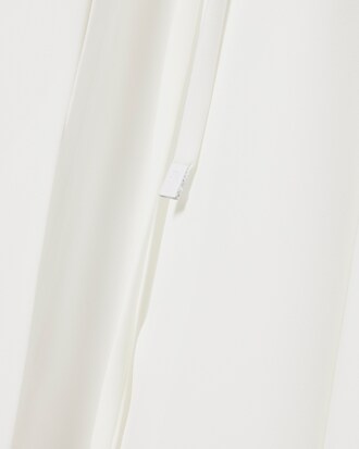 Vestido polo plisado con detalle de bordado Runway