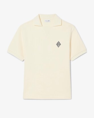 Polo de felpa de corte holgado con insignia en contraste