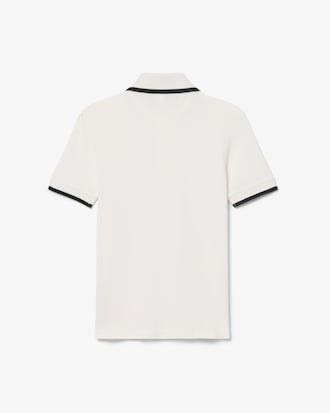 Polo de petit piqu&eacute; con insignia