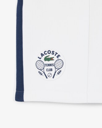 Pantal&oacute;n corto de tenis cl&aacute;sico con insignia decorativa Ultra Dry