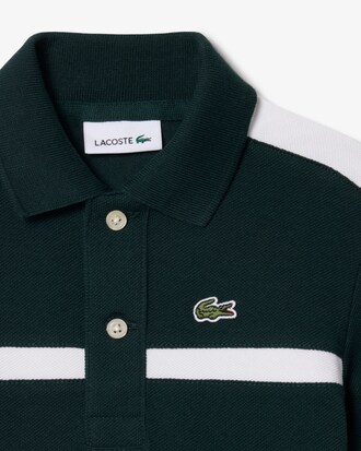 Polo de petit piqu&eacute; con bloques de color