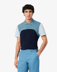 Polo L.12.12 de corte regular con bloques de color