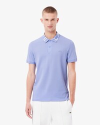 Polo de corte ajustado con detalles de marca en jacquard