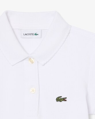 Polo de minipiqu&eacute; con cuello festoneado
