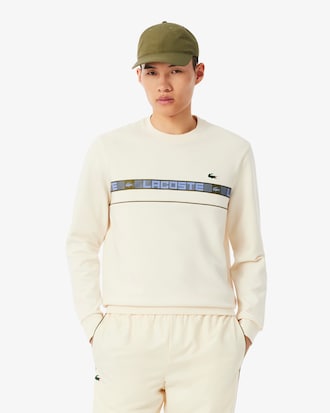 Sudadera de tenis de rayas con detalles de marca
