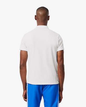 Polo deportivo con estampado de marca Ultra Dry
