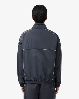 Chaqueta de ch&aacute;ndal hidr&oacute;fuga con ribete en contraste