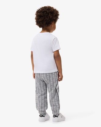 Pantal&oacute;n de ch&aacute;ndal con monograma