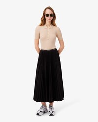 Falda larga plisada con cintura el&aacute;stica