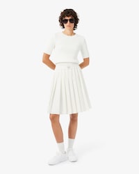 Falda midi plisada con efecto petit piqu&eacute;