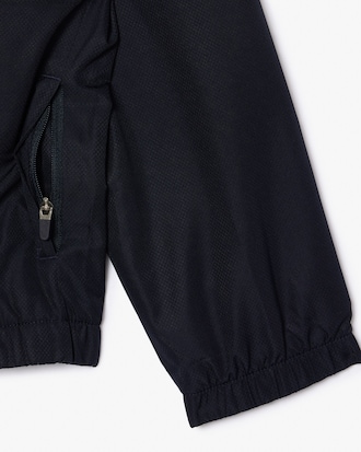 Chaqueta deportiva con capucha y cremallera