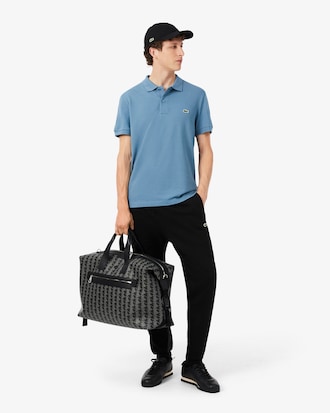 Polo de rayas con logotipo de corte regular