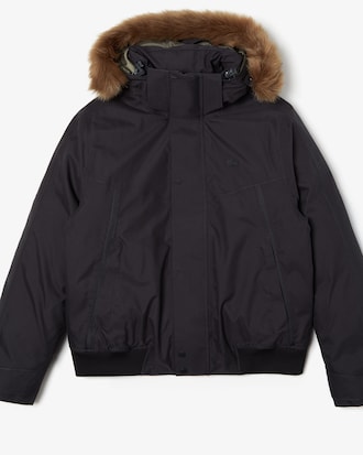 Parka de hombre acolchada corta con capucha de piel sint&eacute;tica