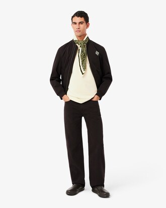 Polo de felpa de corte holgado con insignia en contraste