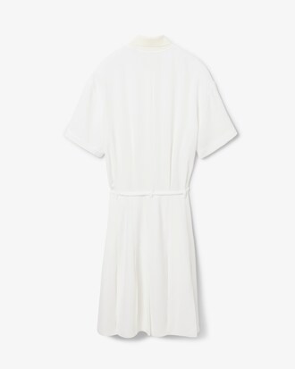 Vestido polo plisado con detalle de bordado Runway