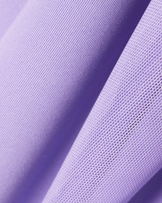 Polo de tenis el&aacute;stico sin mangas de dos tejidos