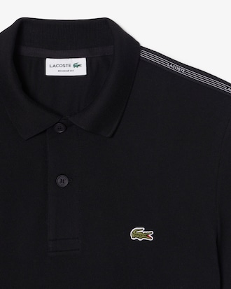 Polo de rayas con logotipo de corte regular