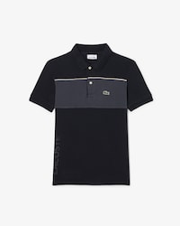 Polo de petit piqu&eacute; con bloques de color