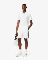 Pantalón corto de tenis ligero de rayas con bloques de color