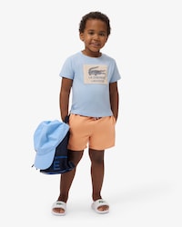 Short de ba&ntilde;o forrado en un solo color