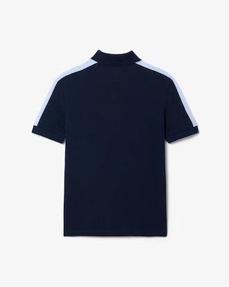 Polo de petit piqu&eacute; con bloques de color
