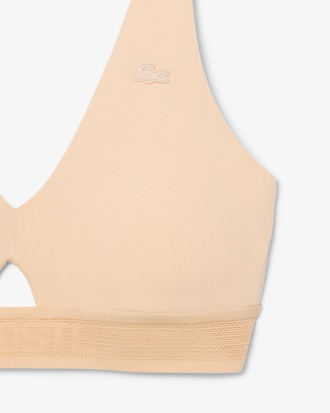 Sujetador de microfibra con cinta perforada