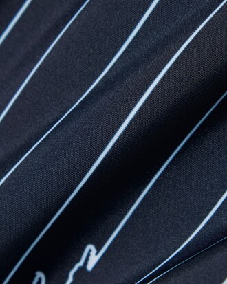 Short de ba&ntilde;o de largo medio con estampado de cocodrilos