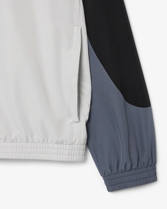 Chaqueta de ch&aacute;ndal deportiva con bloques de color