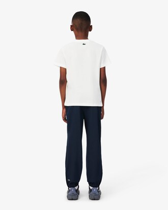 Pantal&oacute;n de ch&aacute;ndal deportivo hidr&oacute;fugo
