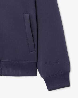 Chaqueta de cuello alto con firma bordada