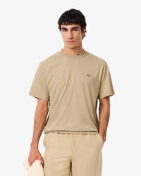 Camiseta con firma bordada