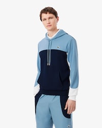 Sudadera deportiva con capucha y cremallera y bloques de color