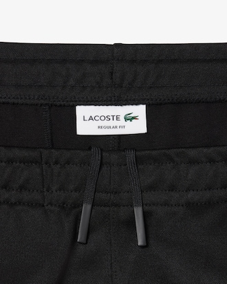 Pantal&oacute;n de ch&aacute;ndal de piqu&eacute; con ribete en contraste