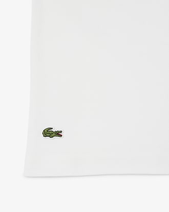 Polo de petit piqu&eacute; con cuello de rayas