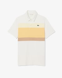 Polo de golf el&aacute;stico con bloques de color Ultra-Dry