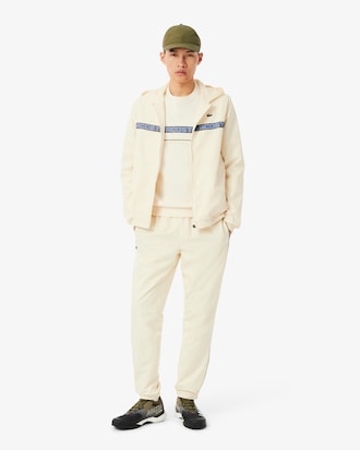 Sudadera de tenis de rayas con detalles de marca