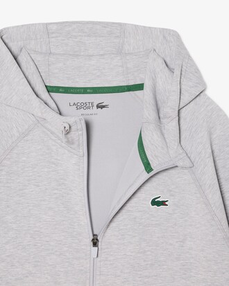 Sudadera deportiva el&aacute;stica con capucha y cremallera